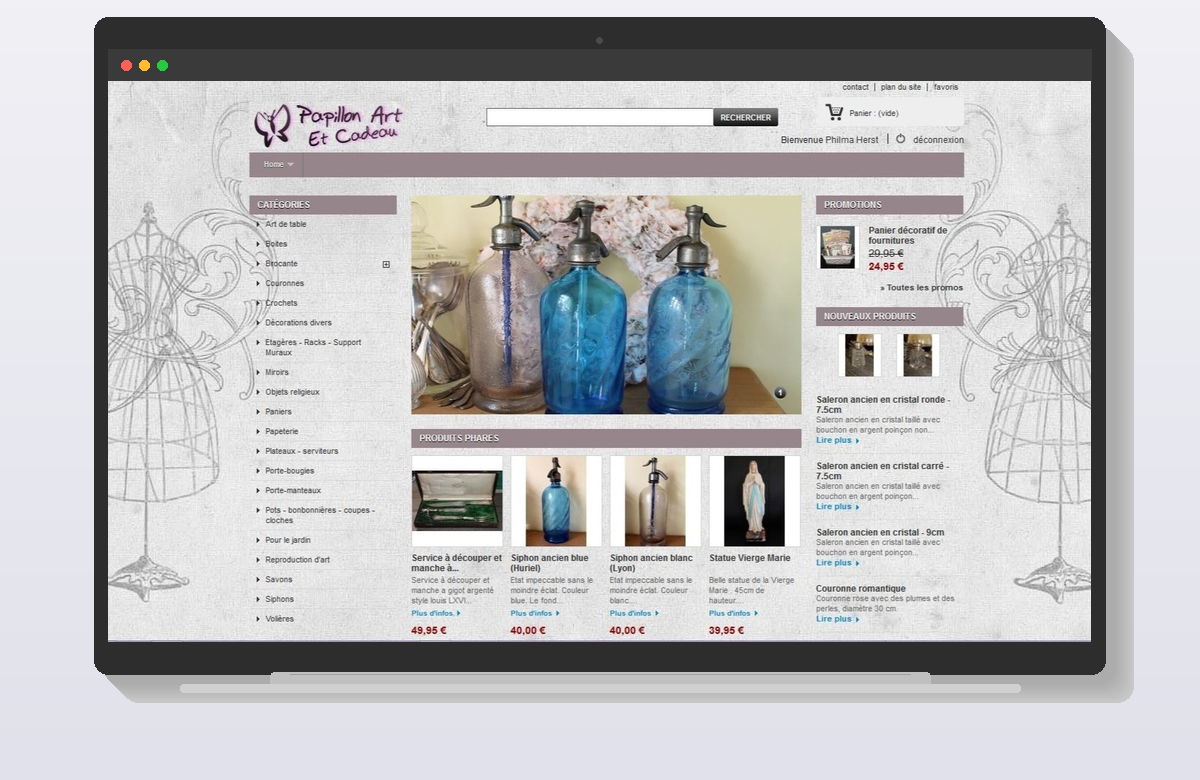 Papillon Art Et Cadeau oude website — verouderd Prestashop design met paars thema en driekoloms layout